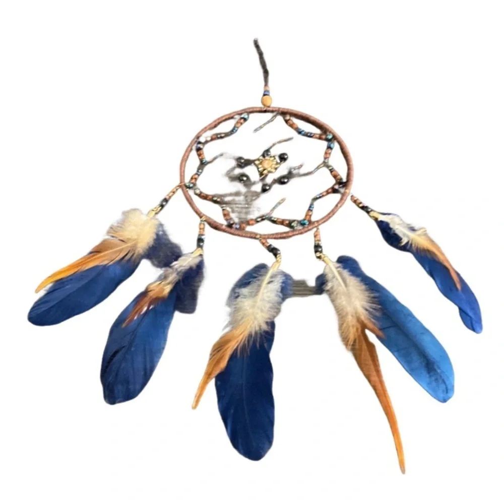 Dream catcher. Blue and tan feathers beaded. Beautiful!